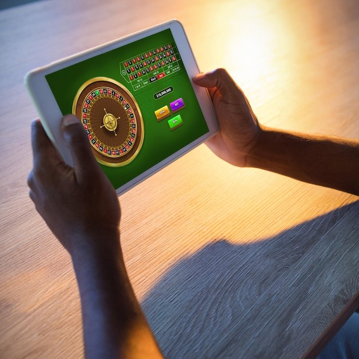 Live Infinite Blackjack dealer at unu4d studio with multi-camera feed showing card deck and player hands